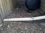Denver Gutter Cleaning - A crushed downspout extension